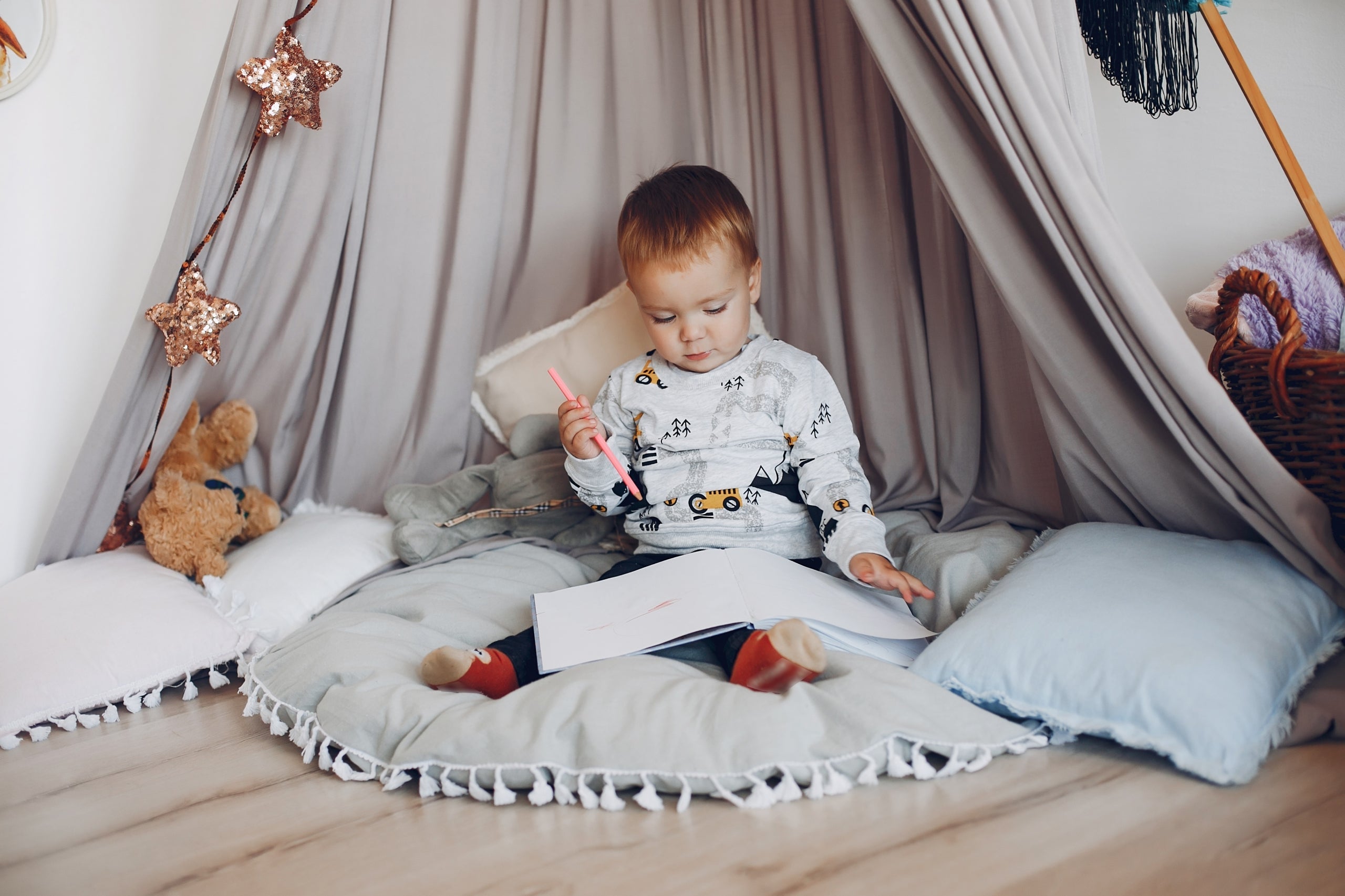 Cute little boy playing at home