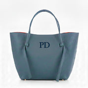 Bolso-piel-personalizado-Versalles-azul-claro-bordado