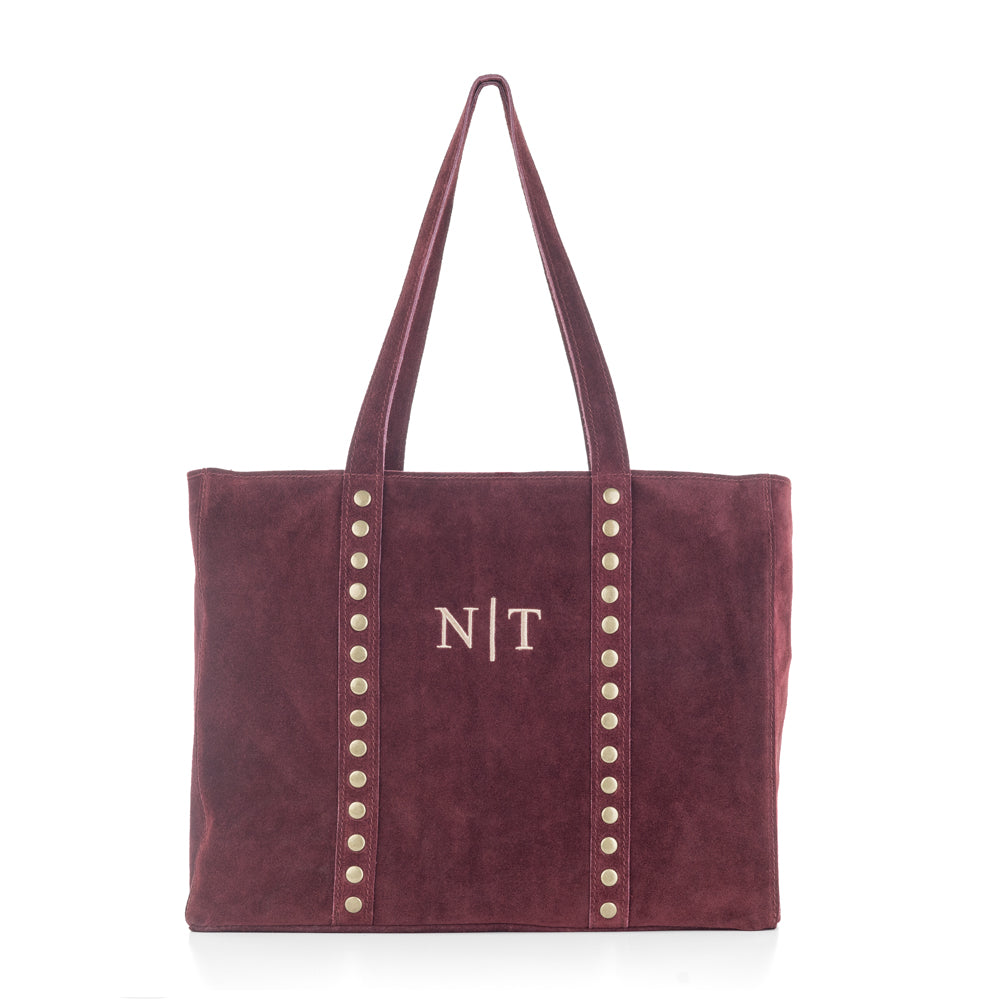 bolso-personalizado-piel-amak-tachuelas-granate-bordado-iniciales-barra.jpg